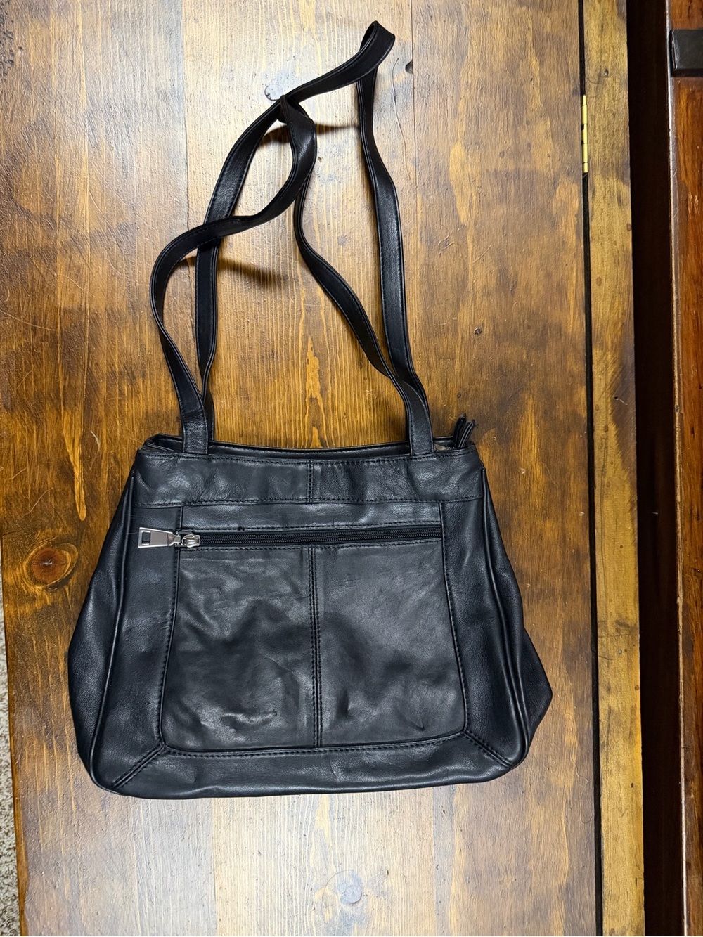 Wilsons Leather Black Shoulder Bag with Front Zip Pocket both sides